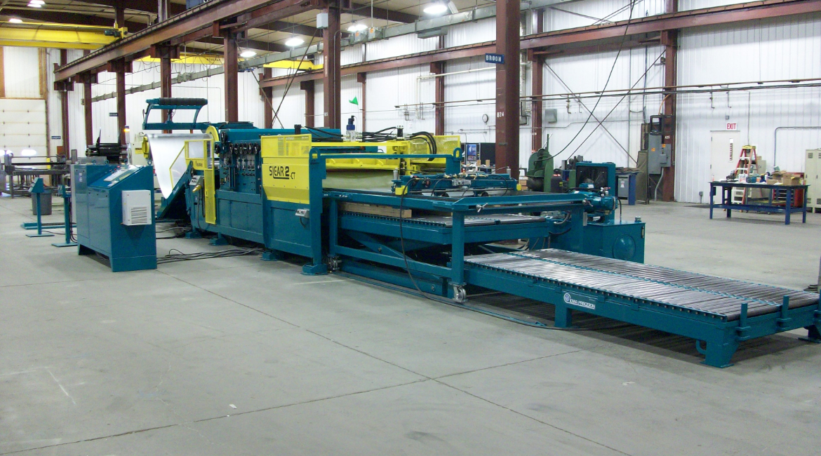 SLEAR, SLEAR-2, SLEAR-II, SLEER, multi-blanking, multi-blanking system, mbl, slitting, slitter, slitter arbor, slitter blades, slitter blade access door, cut-to-length, CTL, stock reel, uncoiler, drop-in uncoiler, multi-coil uncoiler, coil reel, payoff reel, motorized uncoiler, powered uncoiler, coil car, coil loading car, coil loading & storage car, straightener, powered stock straightener, stock straightener, metal coil straightener, peeler table, peeler/threader table, peeler blade, flying shear, flying cutoff, cutoff shear, motorized flying shear, traveling shear, close tolerance, close tolerance package, computerized control, touchscreen, touchscreen HMI, autostacker, stacker, drop stacker, sheet stacker, separator plates, separators, multi-blank stacker, lift table, stack table, runout conveyor, roller conveyor, stack conveyor