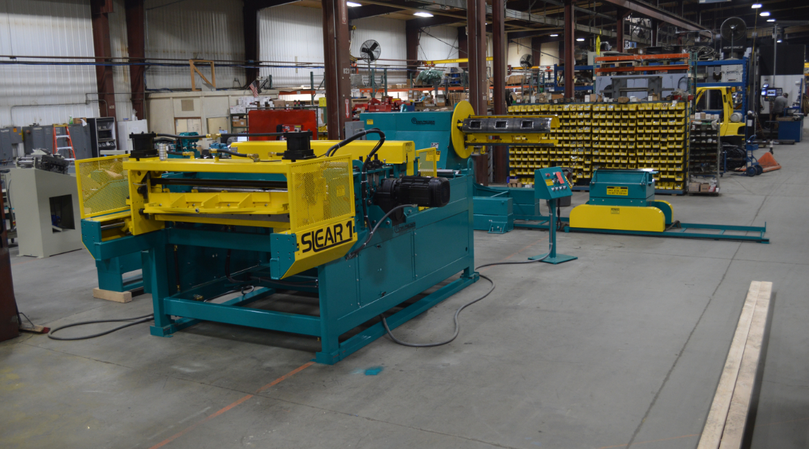 SLEAR, SLEAR-1, SLEAR-I, SLEER, multi-blanking, multi-blanking system, mbl, slitting, slitter, slitter arbor, slitter blades, slitter blade access door, cut-to-length, CTL, stock reel, uncoiler, coil reel, payoff reel, motorized uncoiler, powered uncoiler, coil car, coil loading car, coil loading & storage car, straightener, powered stock straightener, stock straightener, metal coil straightener, peeler table, peeler/threader table, peeler blade, flying shear, flying cutoff, cutoff shear, motorized flying shear, traveling shear, touchscreen, touchscreen HMI